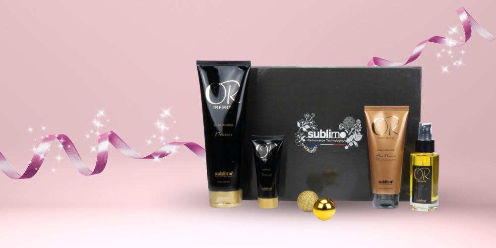 Coffret Cadeau Noël 2025 - Gamme Or Infinite de Sublimo sur fond rose - Disponible J DE C Boutique